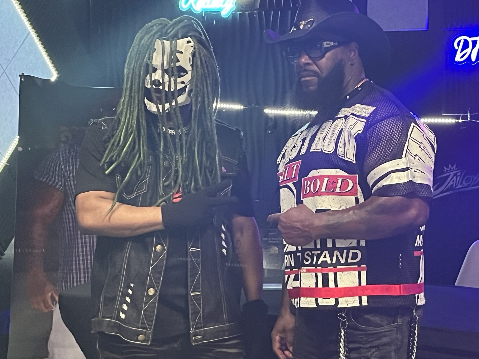 Jai Loyal and the host standing in The Solomon Paulk Show studio